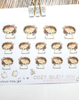Close up of watercolor stickers with writing hedgehogs