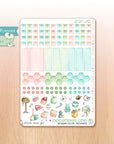 Monthly watercolor planner stickers in Christmas tones