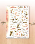 Watercolored love filled stickers with raccoons