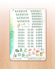 Watercolor planner stickers including lettered headers