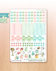 Monthly watercolor planner stickers in Christmas tones
