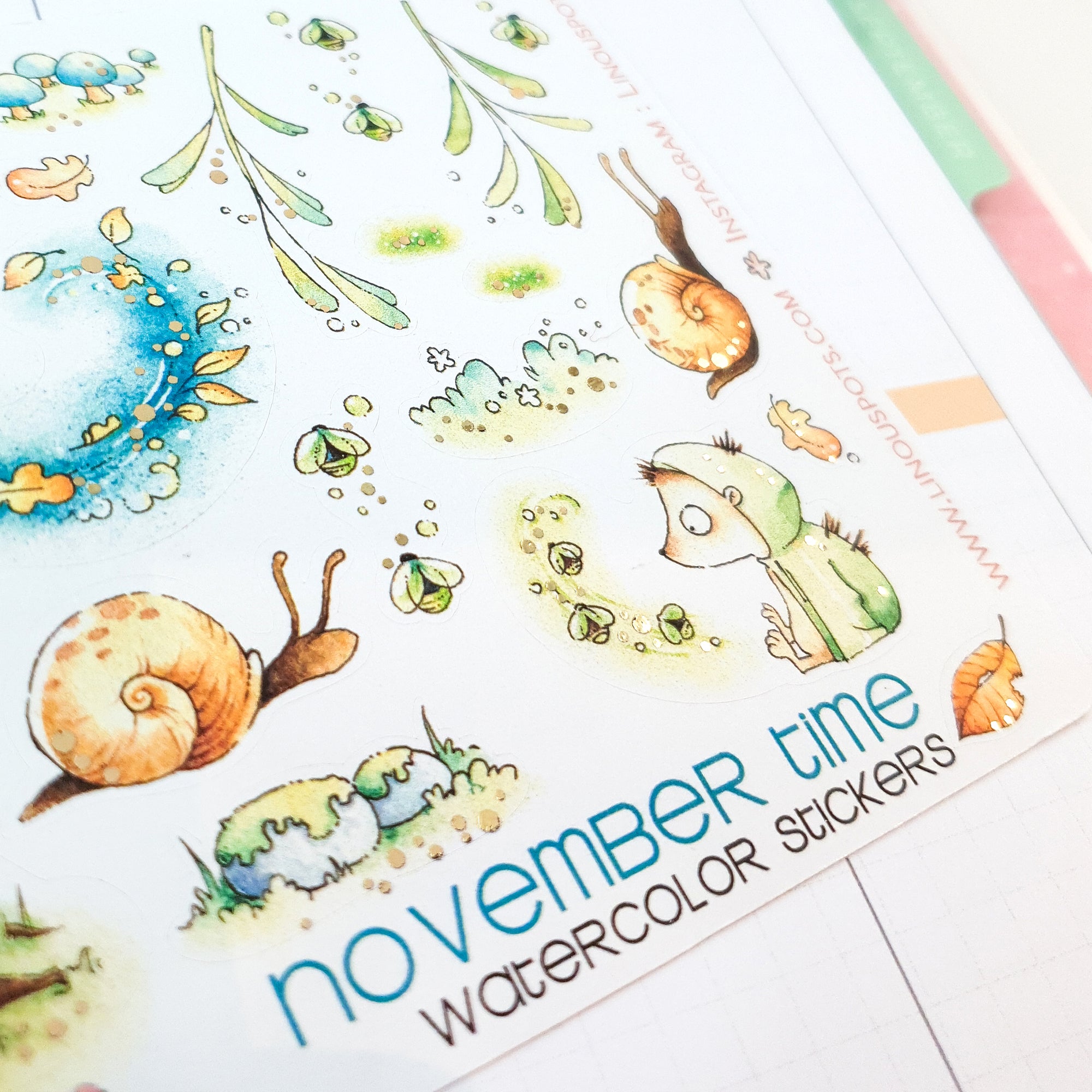 Closeup Watercolor stickers with foiled details with fall mood